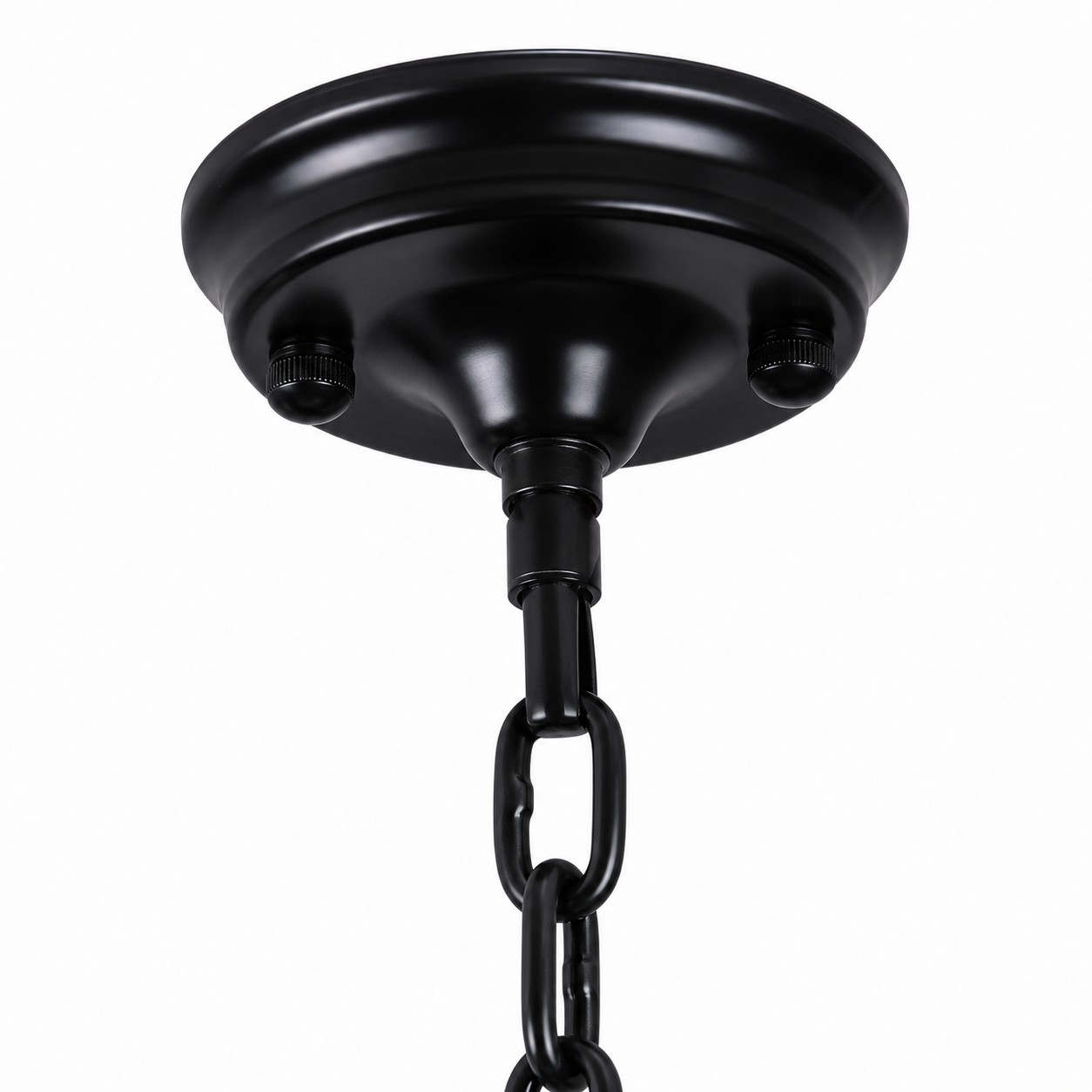 Close view of the round black ceiling canopy