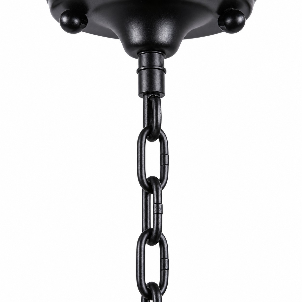 Close view of the black hanging chain and top connector